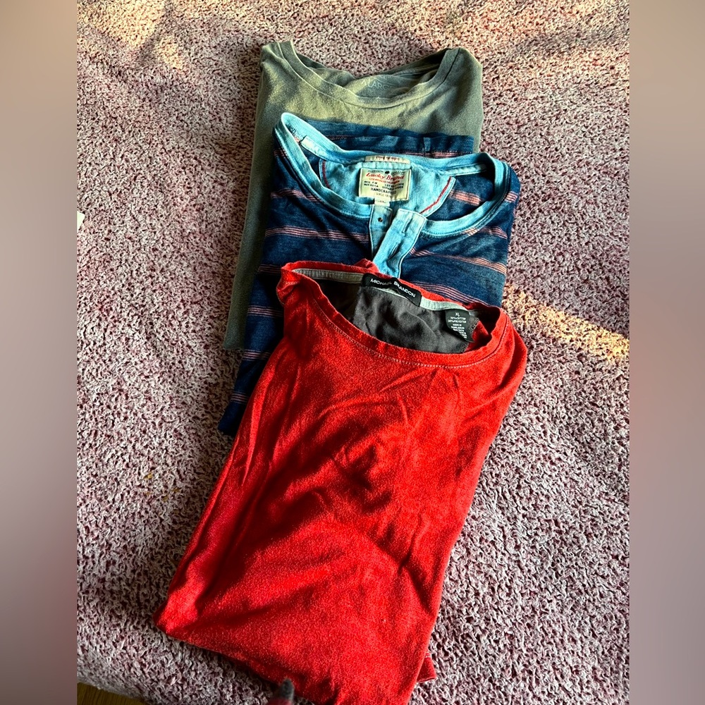 3 pack of XL shirts, good condition. Smoke free home.